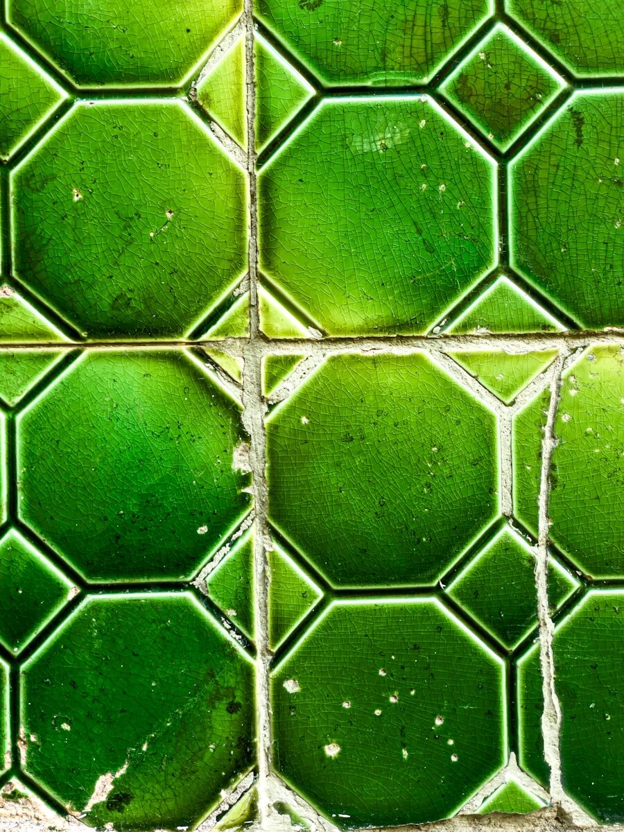Green octagonal tiles with white grout